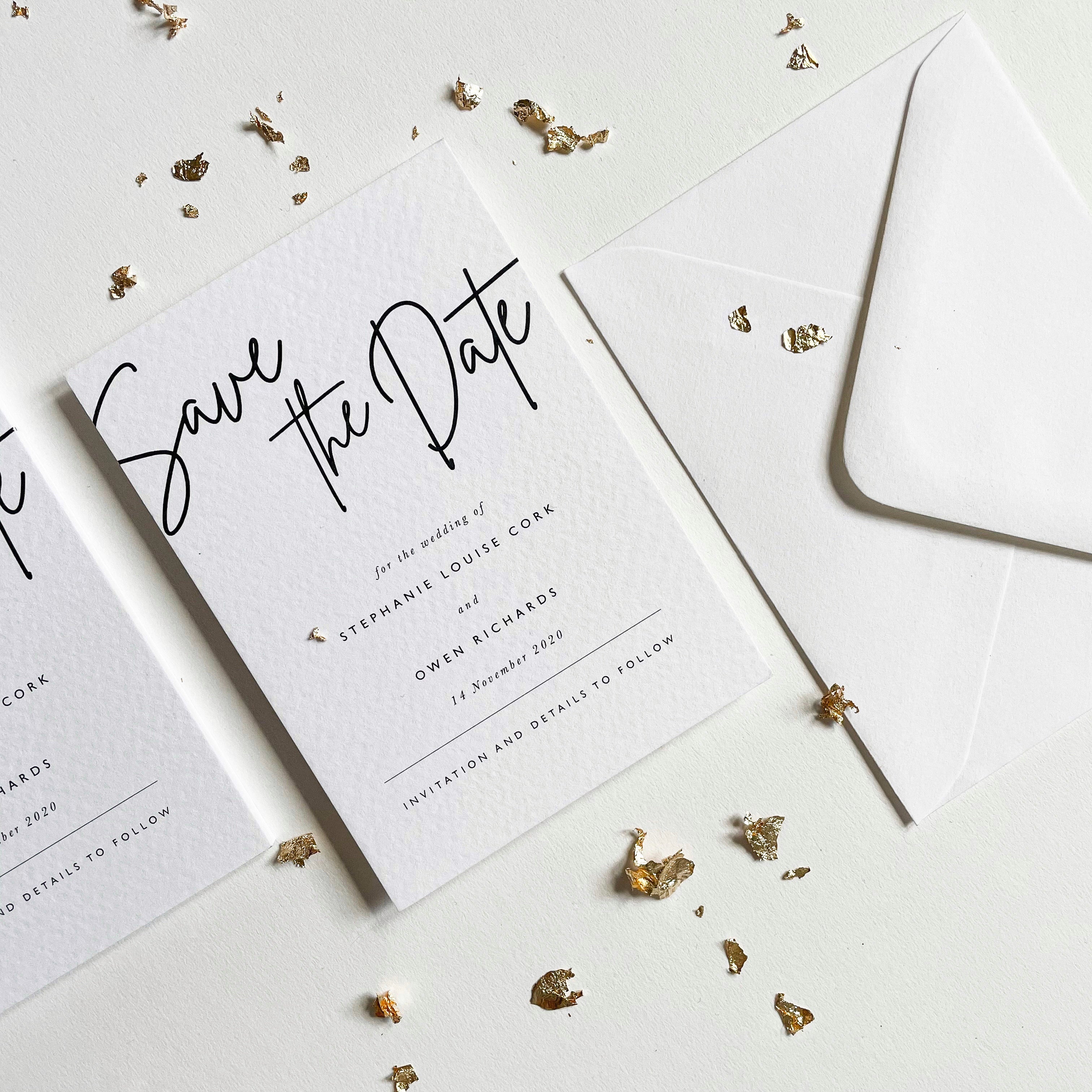 Black and white wedding invitation from the 'You Rock My World' suite by With Love, LeeLea, featuring elegant handwritten script font and a minimalistic design.